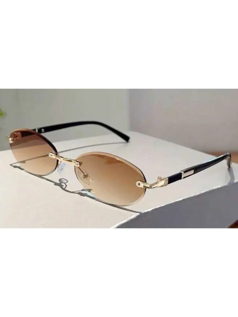 Oval Rimless Brown Lens Sunglasses With Gold & Black Metal Frame
